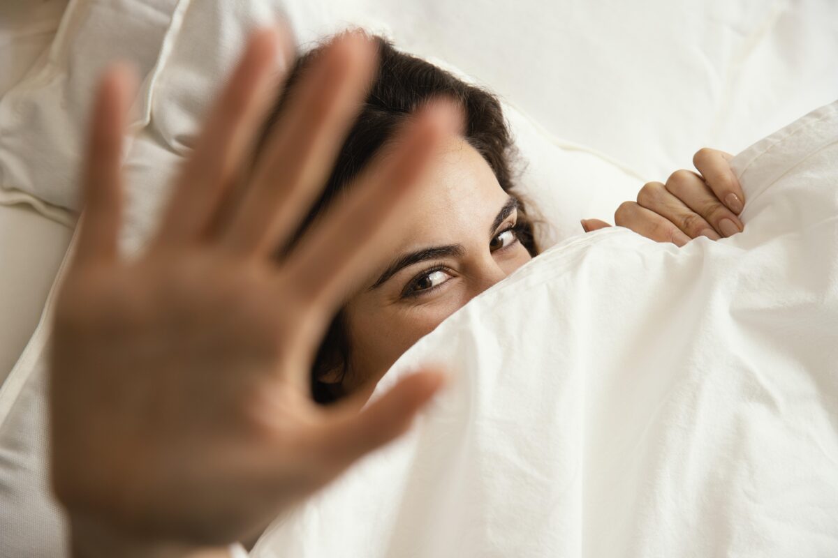 top-view-woman-hiding-sheets-home-2.jpg